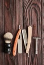 Vintage barber shop tools on wooden background Royalty Free Stock Photo