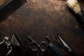 Vintage barber tools dangerous razor hairdressing scissors old manual clipper comb shaving brush. top view. copy space Royalty Free Stock Photo
