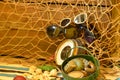 Vintage barometer, beam trawl, sunglasses and retro beach toys. Vintage summer