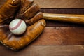 Vintage baseball gear on a wooden background Royalty Free Stock Photo