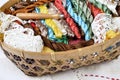 Vintage basket with sewing kit, multi-colored threads Royalty Free Stock Photo