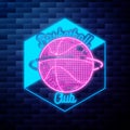 Vintage basketball emblem glowing neon sign on Royalty Free Stock Photo