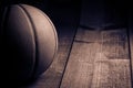 Vintage basketball on hardwood