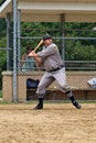 Vintage batter at baseball game