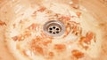 Vintage Beautiful faucet and golden mixer tap on a marble round sink in the bathroom. Interior of an expensive toilet with a Royalty Free Stock Photo