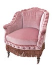 Vintage beautiful pink velor armchair on wheels Royalty Free Stock Photo