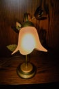 Vintage bedside lamp with leave ornate