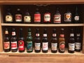 Vintage Beer Bottles on Display Shelf