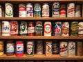 Vintage Beer Cans on Display Shelf