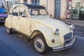 Vintage beige Citroen 2CV with fabric hinged top. Classic car exhibition in Loriol sur Drome, France. Royalty Free Stock Photo