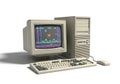Vintage beige computer tower monitor keyboard and mouse setup displaying a retro game Royalty Free Stock Photo