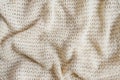 Vintage Beige Knitted Fabric Texture. Crochet Warm Woolen Yarn Background.