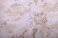 Vintage beige wallpaper with floral pattern