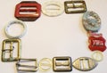 VINTAGE BELT BUCKLES ON OFF WHITE BACKGROUND