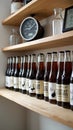 Vintage beverage bottles lined on wooden shelves in kitchen setting Royalty Free Stock Photo
