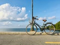 Vintage bicycle at the beach on blue sky Royalty Free Stock Photo