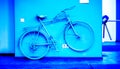 Vintage blue color bicycle on decorative house wall Royalty Free Stock Photo