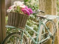 Vintage bicycle with flowers in basket