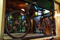 Vintage bicycle In the interior of a hipster cafe. Royalty Free Stock Photo