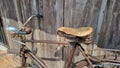 Vintage bicycle on old rustic dirty wall house Royalty Free Stock Photo