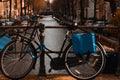 Vintage bicycle is parked on a silver rail, overlooking a stunning view of the ocean