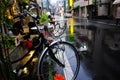 Vintage bicycle parking on retro road rainy day