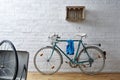 Vintage bicycle in whitebrick studio