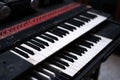 Selective Focus of The Vintage Big Piano Keyboard. Many keys and buttons on a big old brown church organ. Bangkok, Thailand in Royalty Free Stock Photo