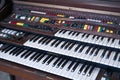 The Vintage Big Piano Keyboard. Many keys and buttons on a big old brown church organ. Bangkok, Thailand in January 5, 2020 Royalty Free Stock Photo