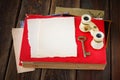 Vintage binoculars on red ancient book with blank page for text. nostalgic vintage background