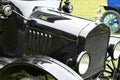 A highly polished vintage black automobile