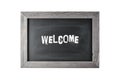 Vintage black board or school chalkboard with wooden frame and word Welcome isolated on white Royalty Free Stock Photo