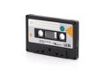 Vintage black compact cassette on white background Royalty Free Stock Photo