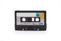 Vintage black compact cassette on white background Royalty Free Stock Photo