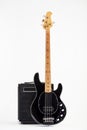 Vintage black electric bass guitar and amplifier Royalty Free Stock Photo