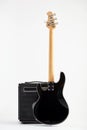 Vintage black electric bass guitar and amplifier Royalty Free Stock Photo