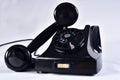 Vintage black old telephone handset on white background Royalty Free Stock Photo