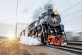 Vintage black steam locomotive train rush railway Royalty Free Stock Photo