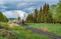 Vintage black steam locomotive train with wagons rush railway Royalty Free Stock Photo