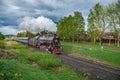 Vintage black steam locomotive train with wagons rush railway Royalty Free Stock Photo