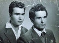 Vintage black and white photo of brothers, 1950s European.