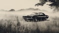 Vintage Black And White Photo: Chevrolet Camaro In Grassy Field Royalty Free Stock Photo