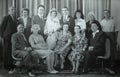 Vintage black and white photo of family wedding, 1950s European.