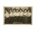 Vintage black and white photo of women possibly in 1900s uniform - Social History