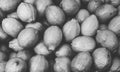 Black and white shot of a pile of lemons