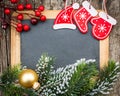 Vintage blackboard blank framed in Christmas tree branch and dec Royalty Free Stock Photo