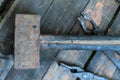 Vintage blacksmith tools on wooden table