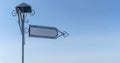 Vintage blank directional road signs against blue sky. White metal arrows on the signpost. Royalty Free Stock Photo