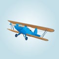 Vintage blue biplane in the sky