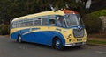 Vintage Blue and Cream Duple Vega Coach parked on road.